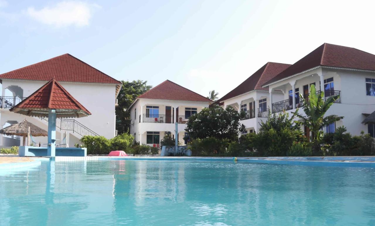 Visitor'S Inn Джамбиани Экстерьер фото